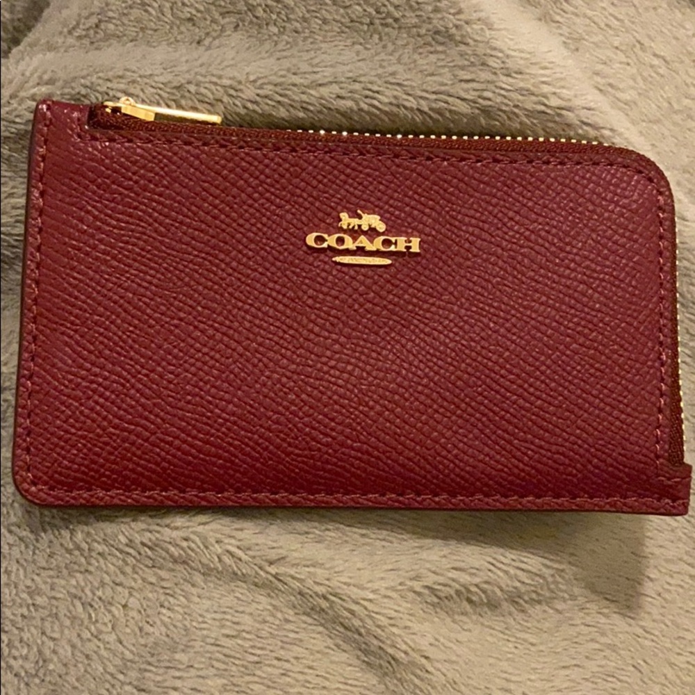 Red coach card holder with zipper pocket for coins